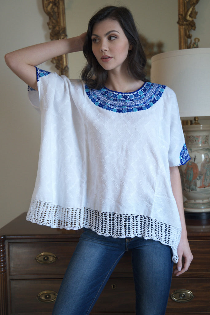 white and blue Guatemalan blouse, hand woven and embroidered