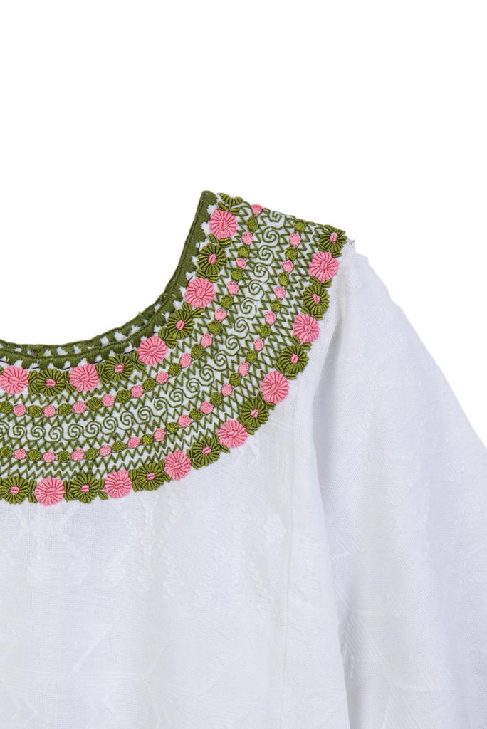 pink and green embroidered blouse with crochet detail