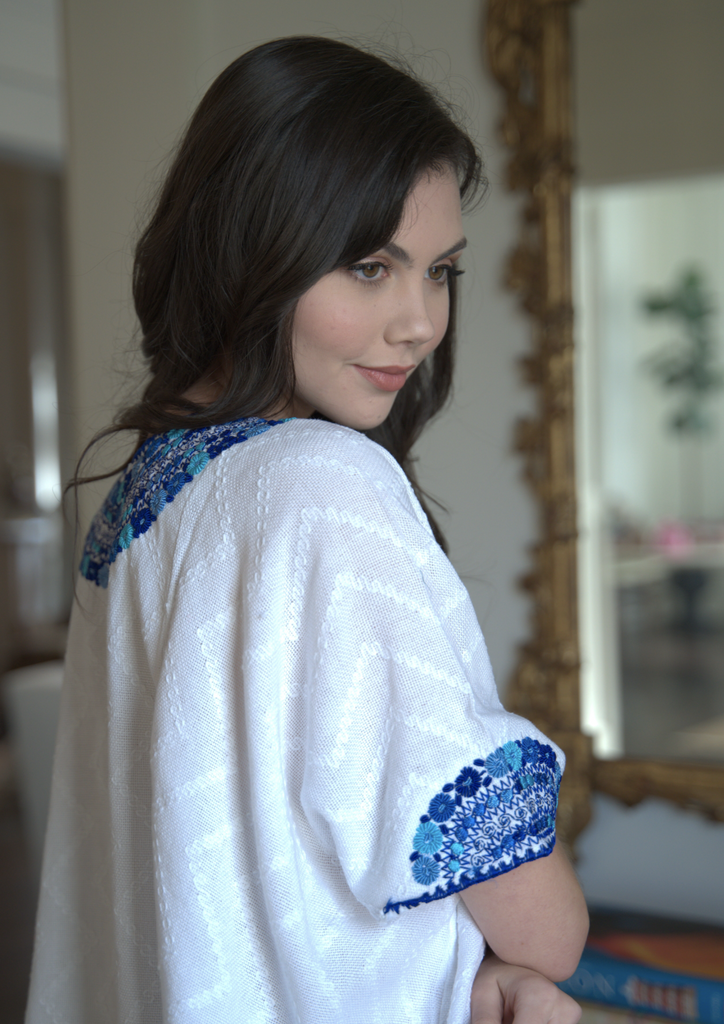white and blue Guatemalan blouse, hand woven and embroidered tunic sleeve detail